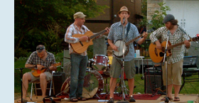 Photo of Doug and his band.